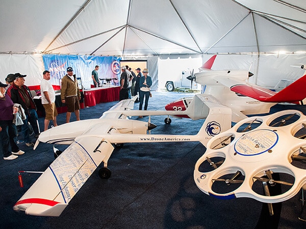 People view the Drone America display booth on Thursday, Sept. 17, 2015 at the Reno AIr Races in Reno, Nev. Photo by Kevin Clifford